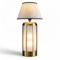 Glass and metal table lamp with linen shade for home office use 30 x 15 x 15cm